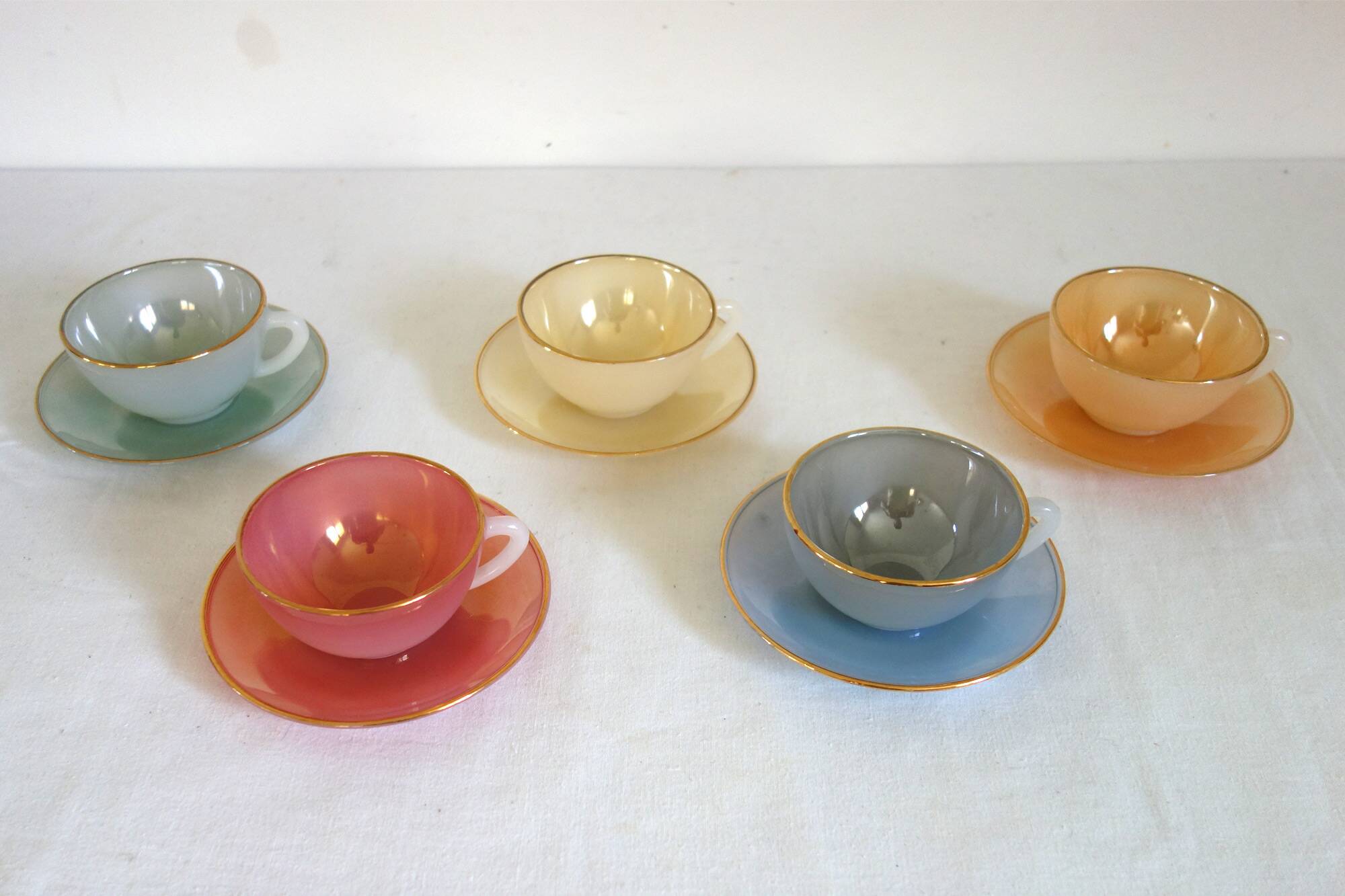 5 vintage Arcopal Harlequin teacups with saucers