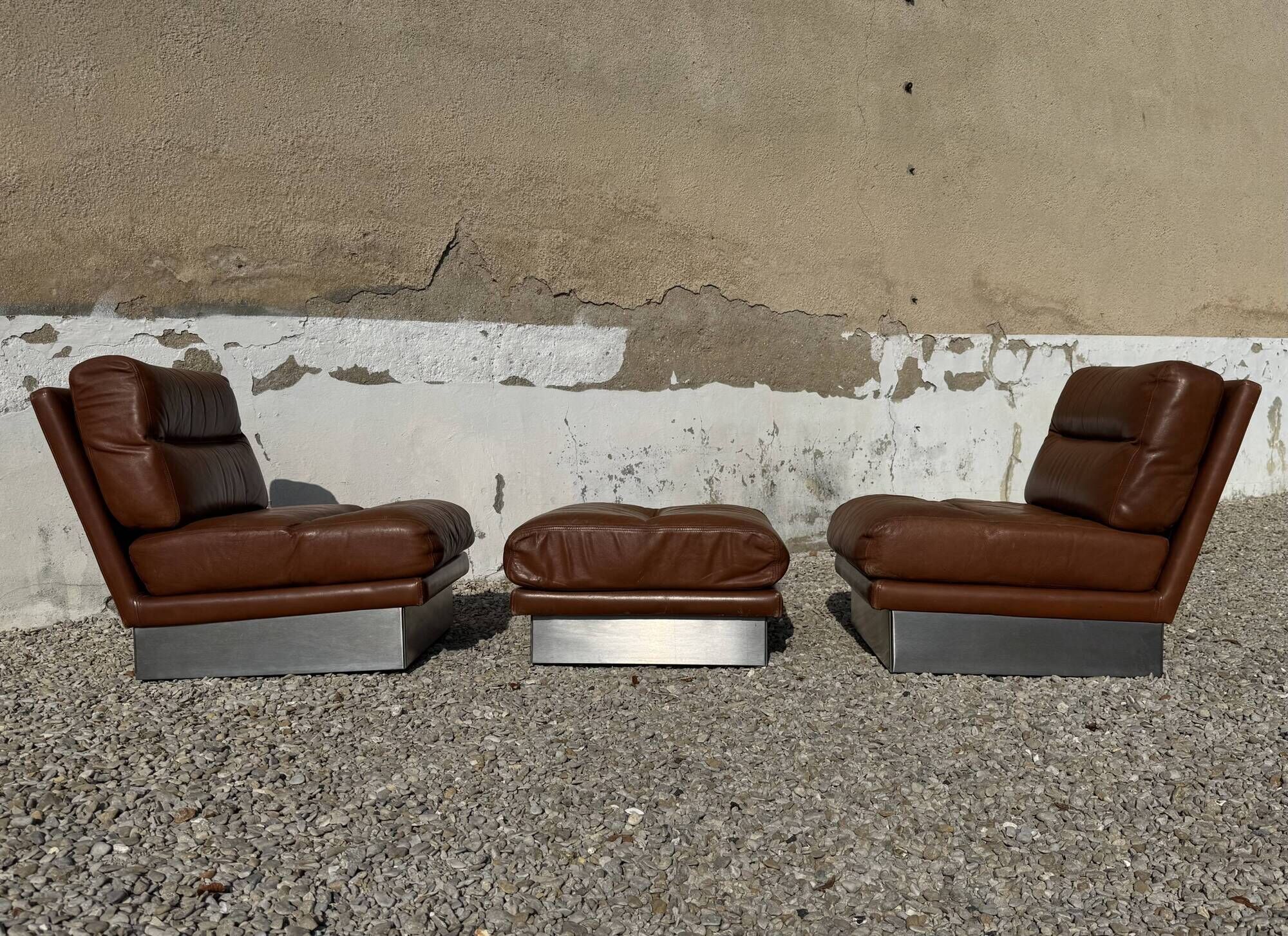 2 armchairs and 1 ottoman in brushed aluminium and brown leather, France, 1970