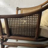 Colonial armchair in wood and canework