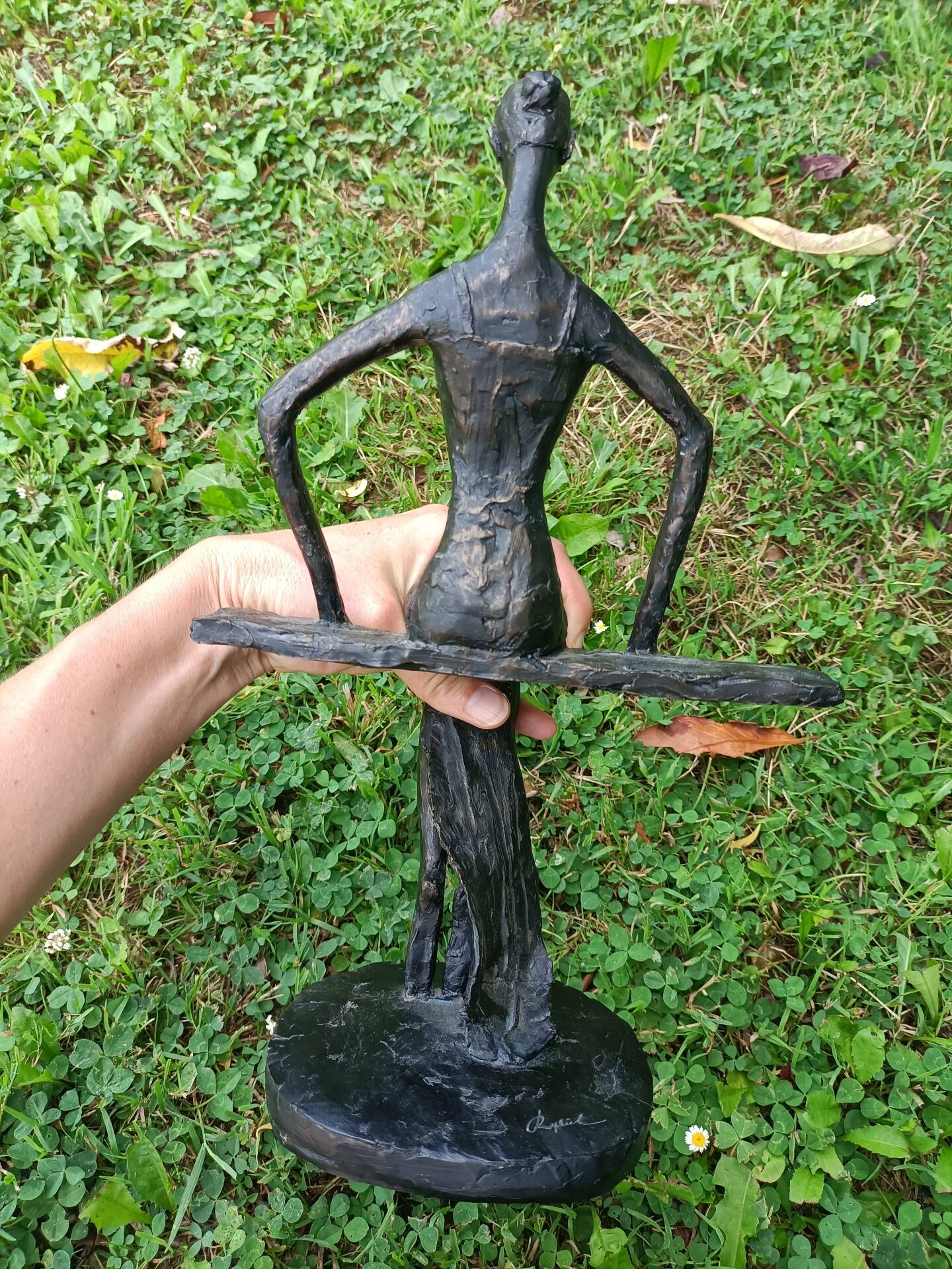 Sculpture of a dancer on a swing signed by Raphaël