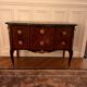 18th-century commode in rosewood and amaranth veneer from Fontainebleau.