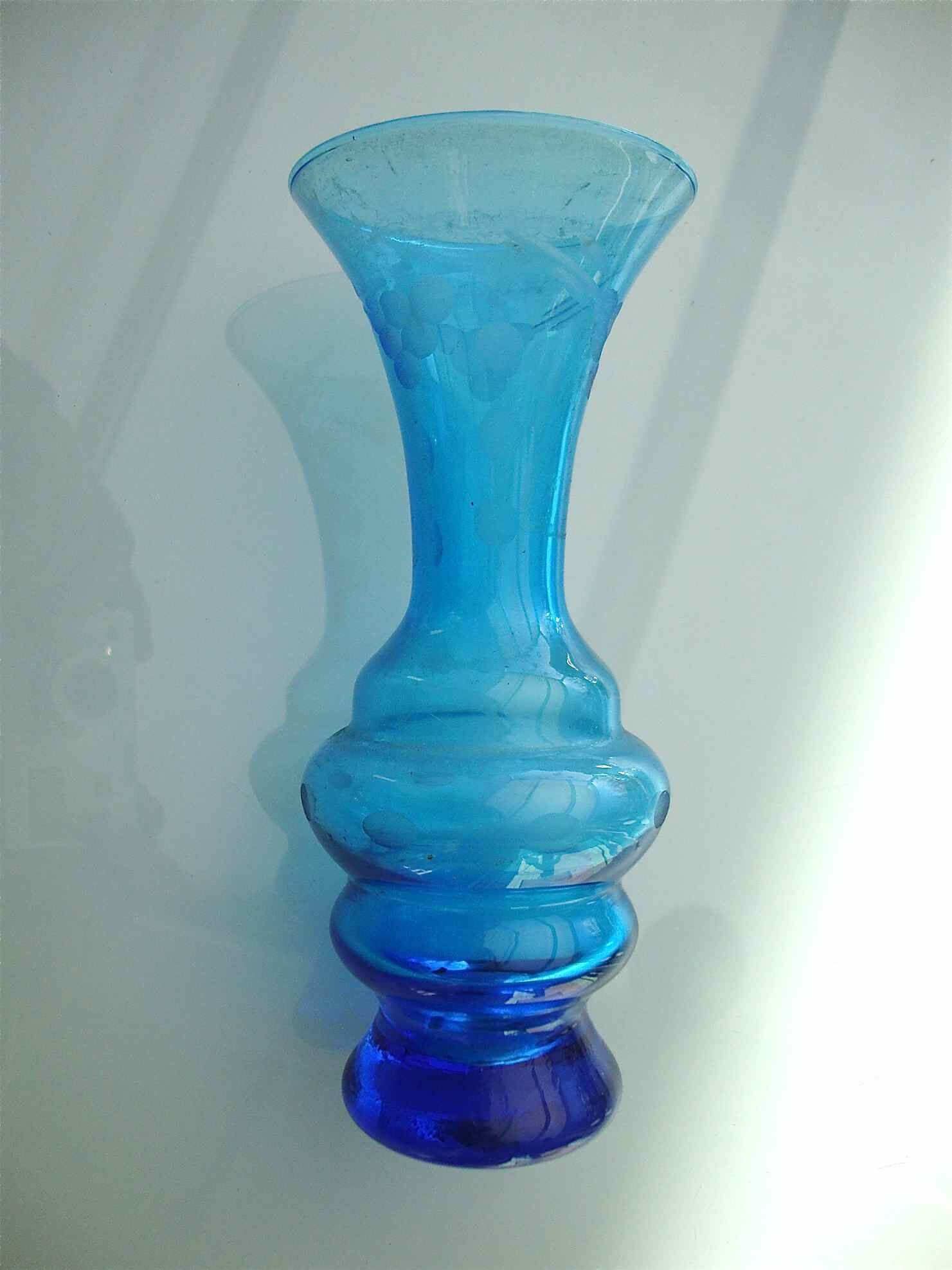 Ancient vase in engraved glass