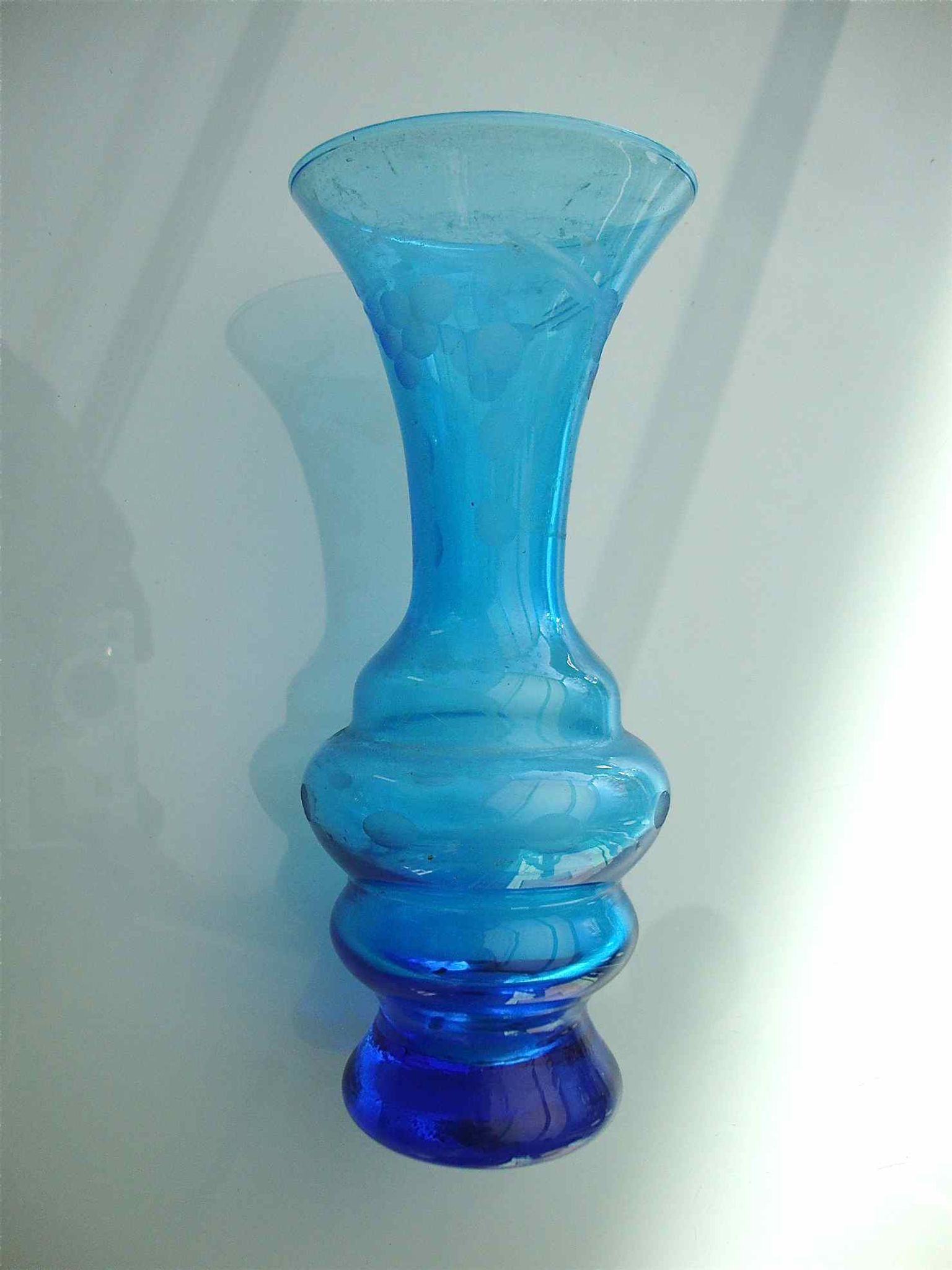 Ancient vase in engraved glass