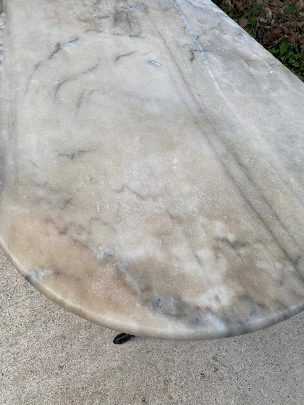 Table de bistrot marbre ovale et acier noir 4 couverts 120cm