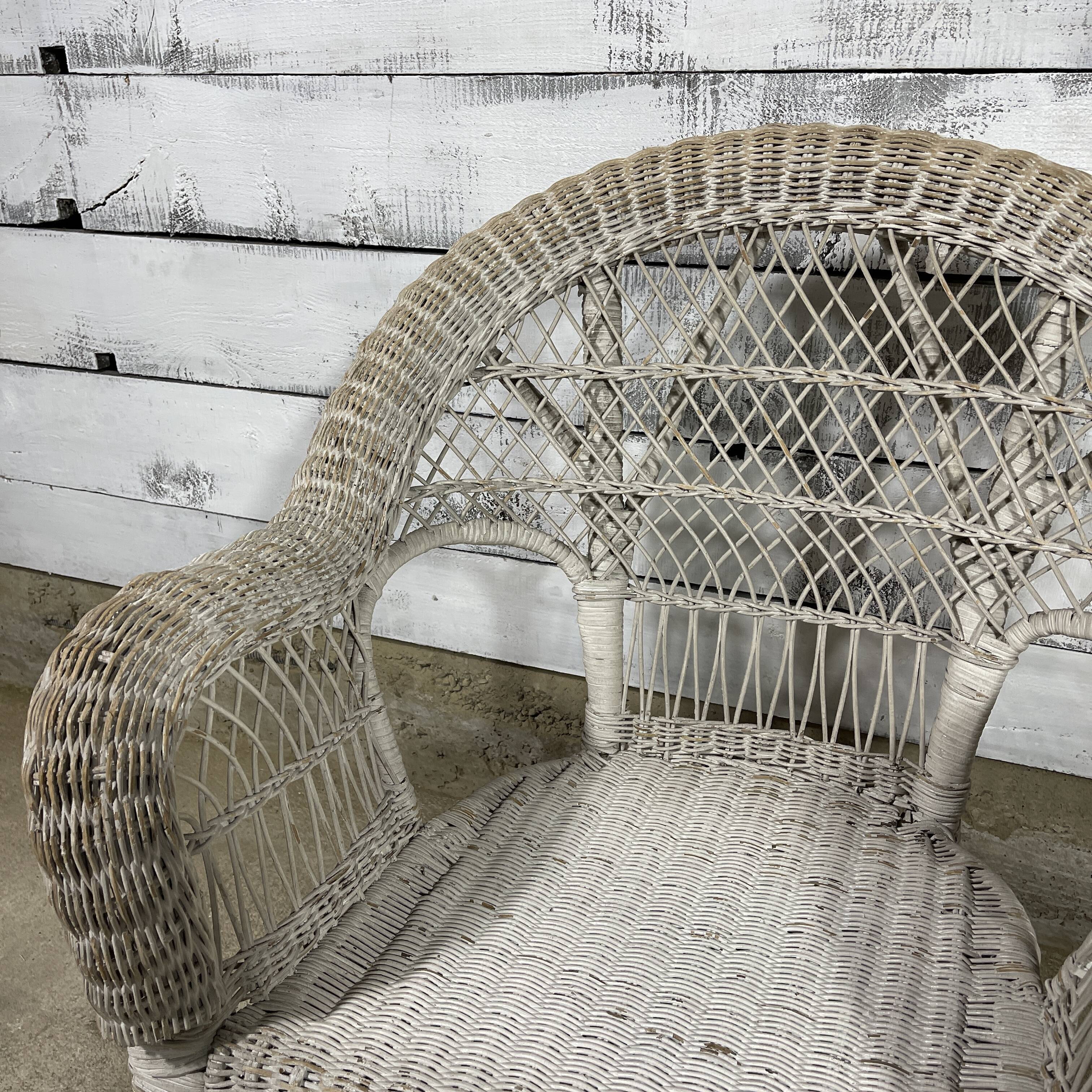 Vintage white rattan armchair