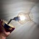 Vintage tulip wall light in amber glass
