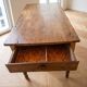 Rustic solid wood dining table with drawer