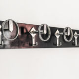 Hang wall clothes, Italy 70s.