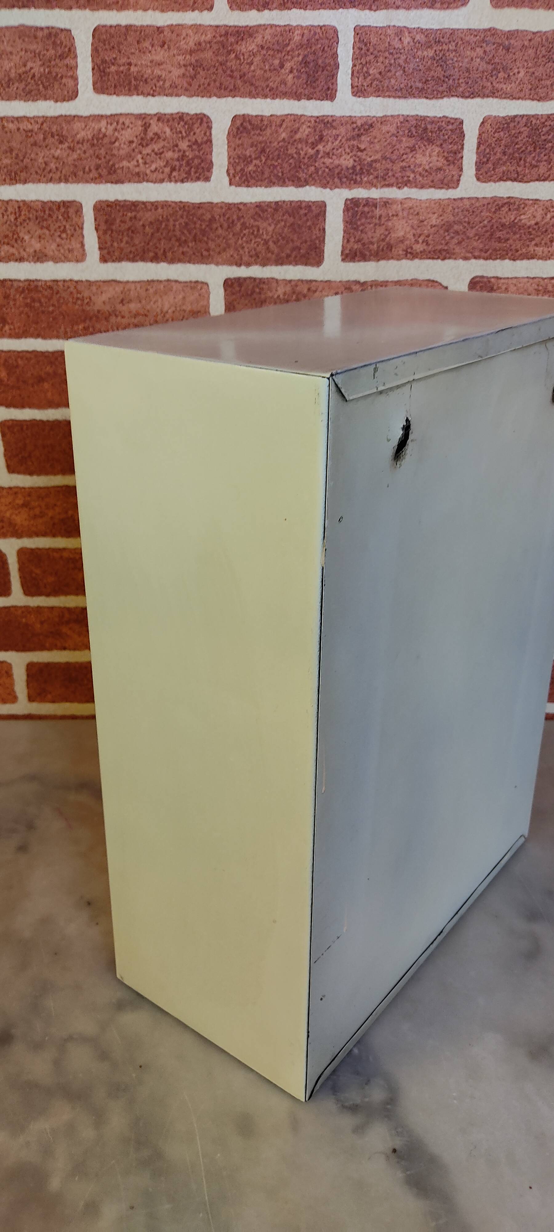 Sheet metal bathroom cabinet with mirror