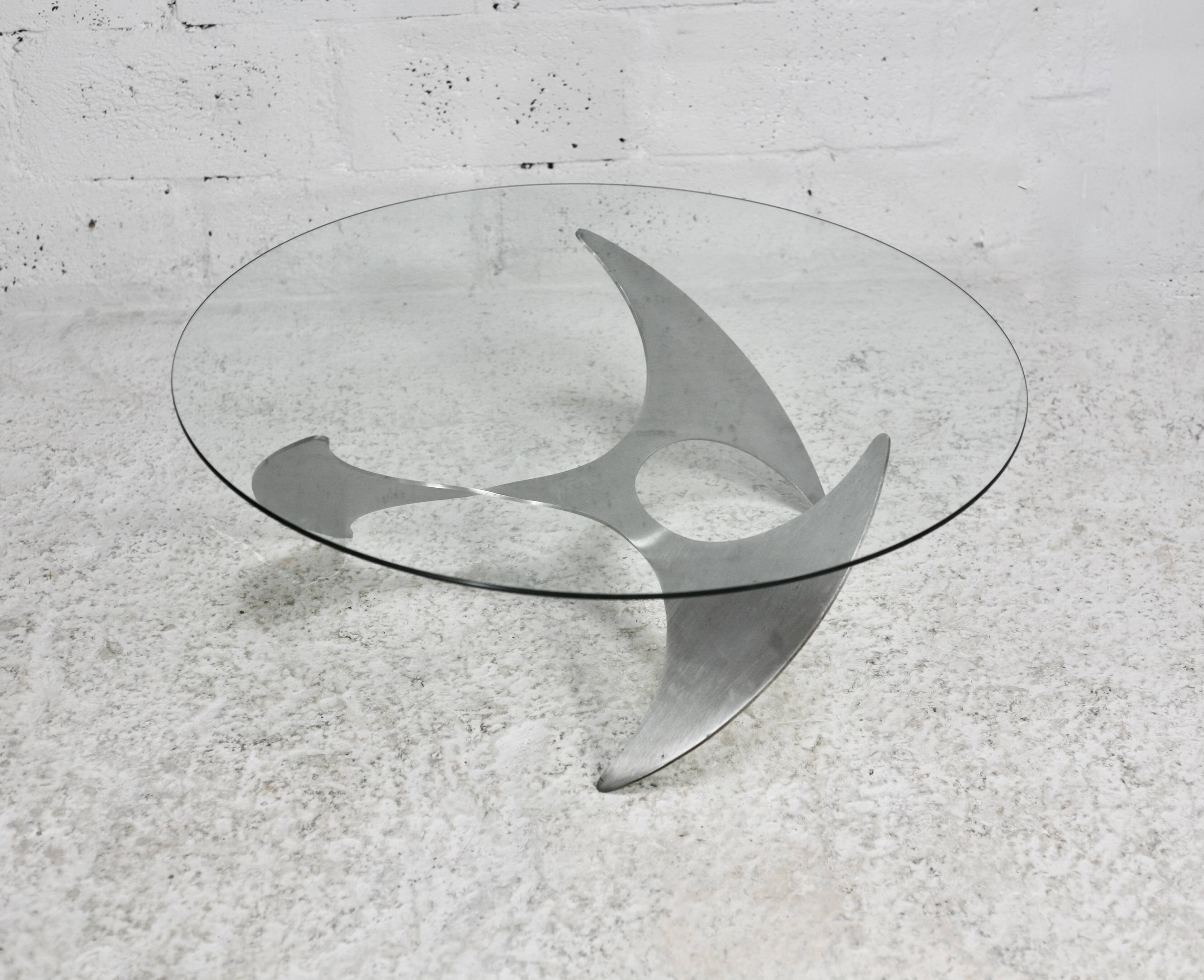 "space age" coffee table. Steel legs, glass slab. Circa 1970