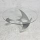 "space age" coffee table. Steel legs, glass slab. Circa 1970