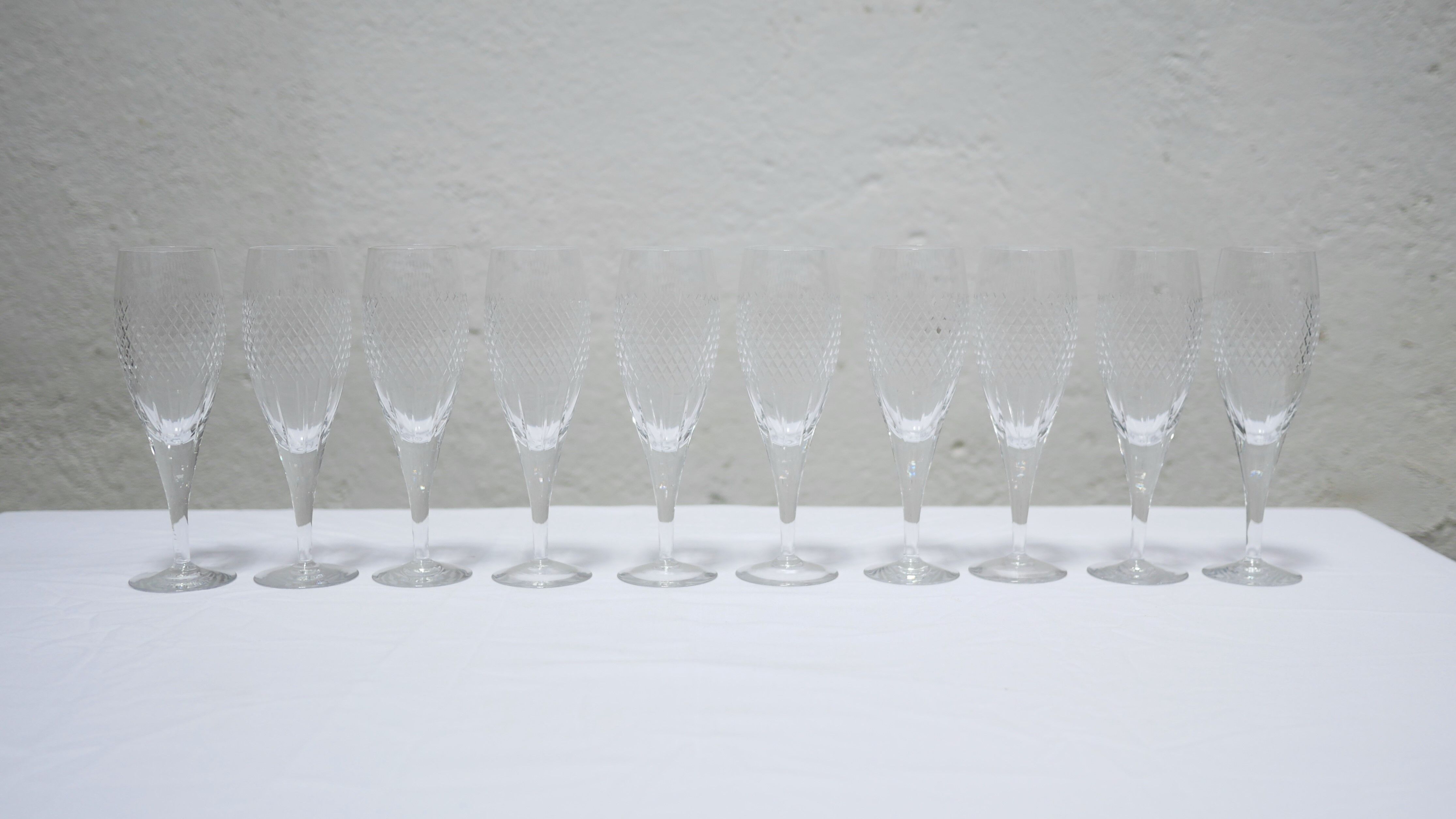 Series of 10 vintage crystal champagne flutes