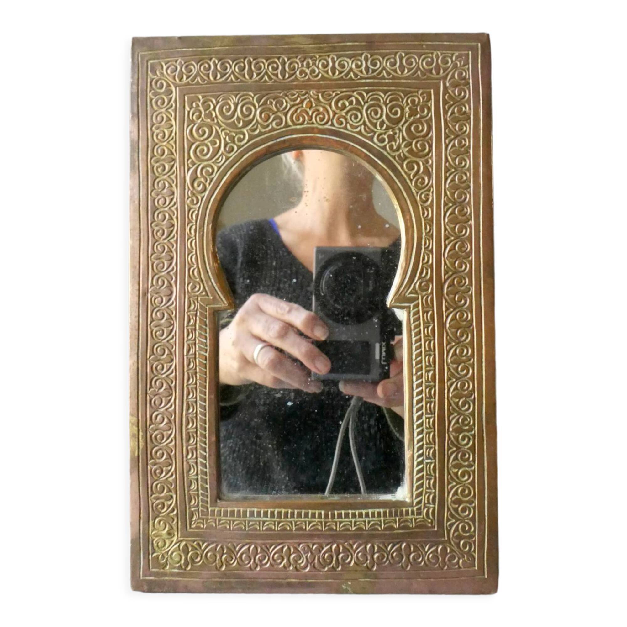 Moroccan mirror in chiseled brass, 70s