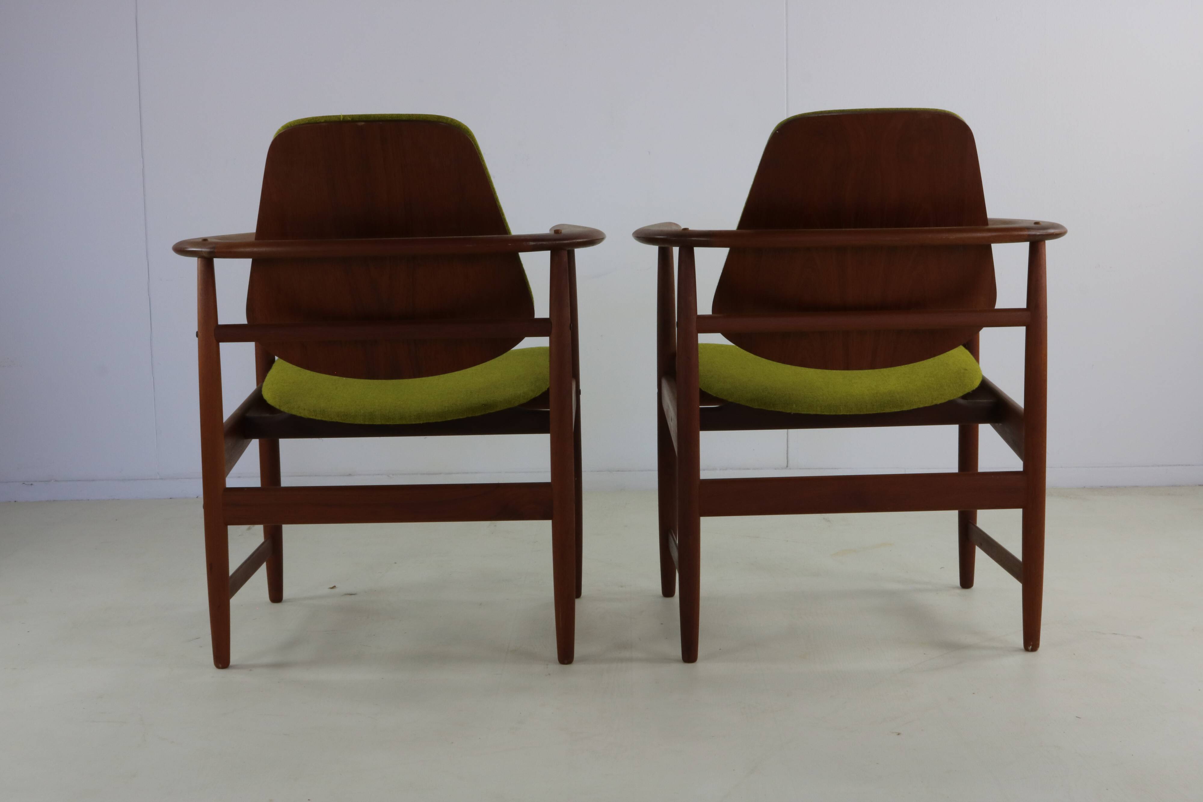 Two Danish design lounge arm chairs by Arne Hovmand Olsen