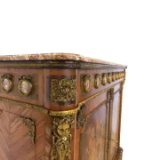 An antique French Louis XVI-style marble-top side cabinet