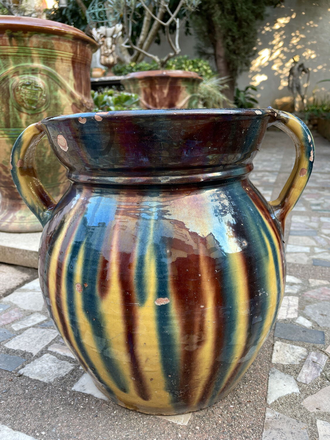 Old flower jar with two glazed earth handles