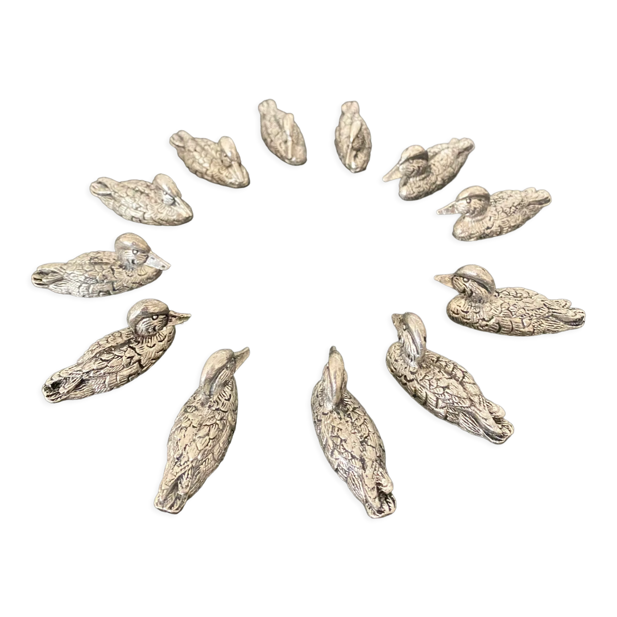 12 metal duck-shaped knife holders