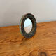 Round mirror in gilded enamelled ceramic with inlay
