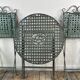 Patinated green folding wrought iron garden set with 1 table + 2 chairs.