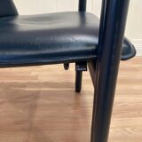 Set of 4 designer leather and metal armchairs.