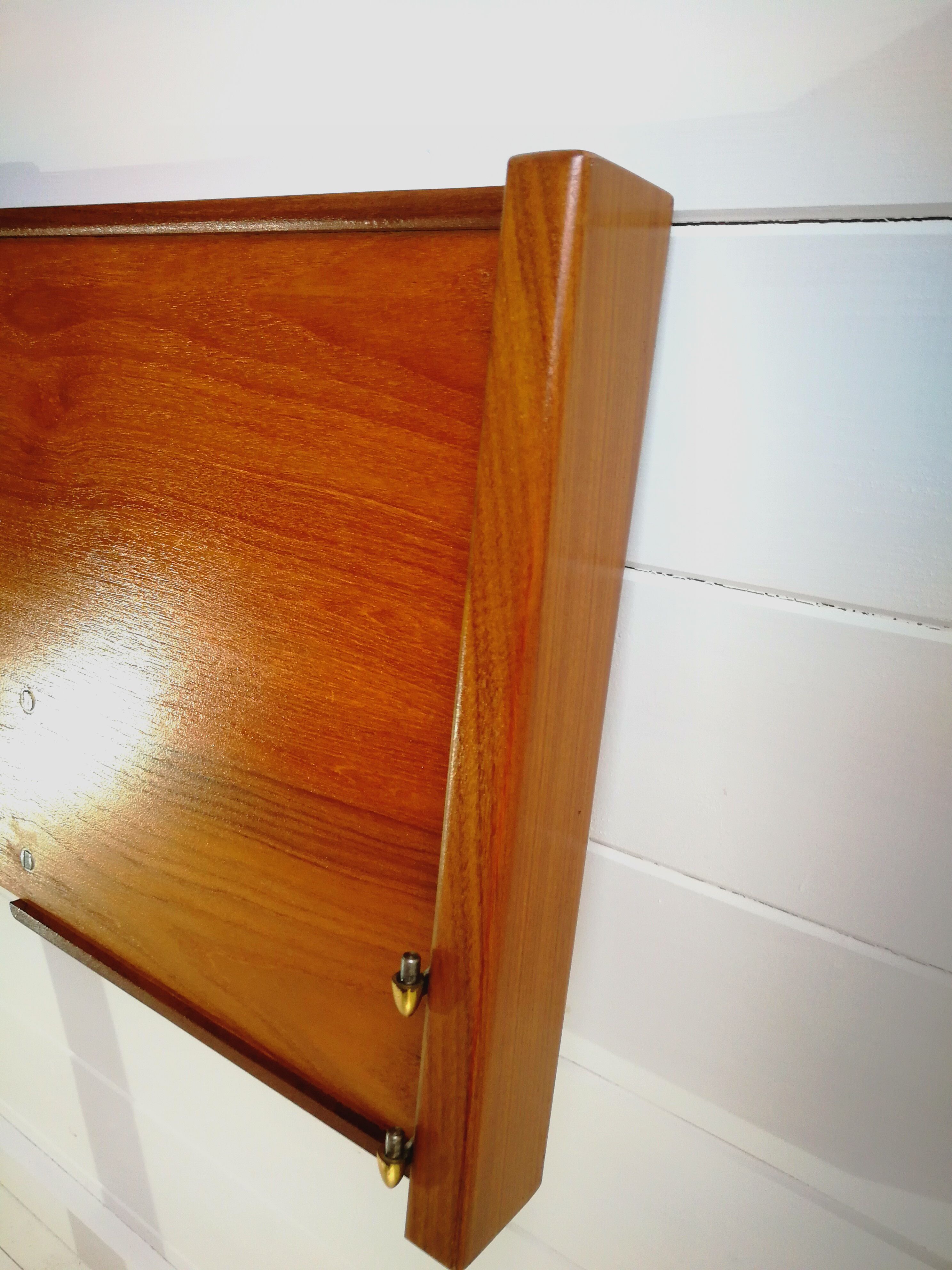 Mid century 1970s retro teak headboard with two hinged bedsides, upholstered in black by 'slumberlan