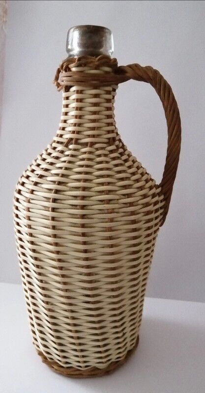 Vintage glass and wicker bottle