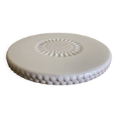 Pierre Motton glazed earthenware scalloped trivet for Gien