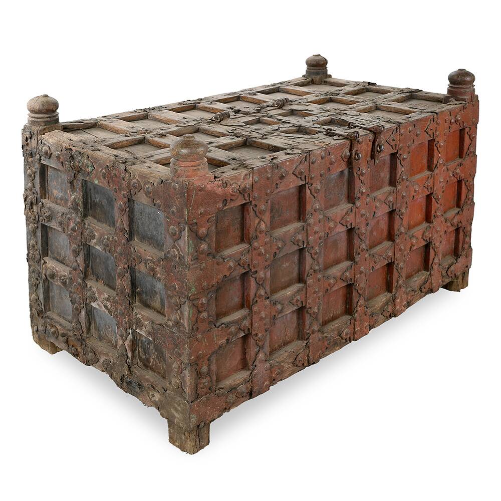 Large wooden and metal chest with red patina