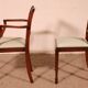 set of 10 chairs and two mahogany armchairs in Hepplewhite style