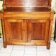 Sideboard with half-columns in walnut, Empire period.
