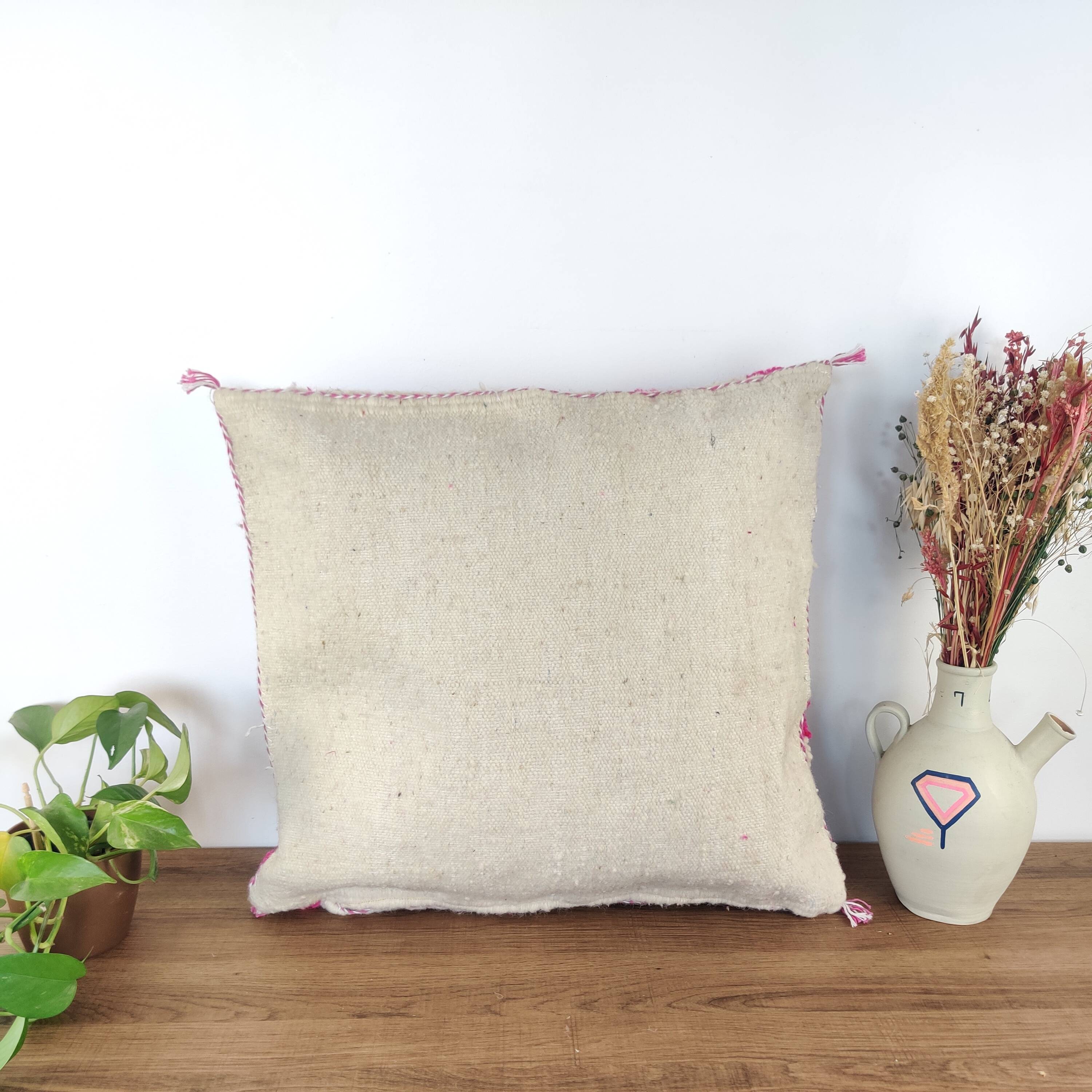 Berber pink checkerboard cushion