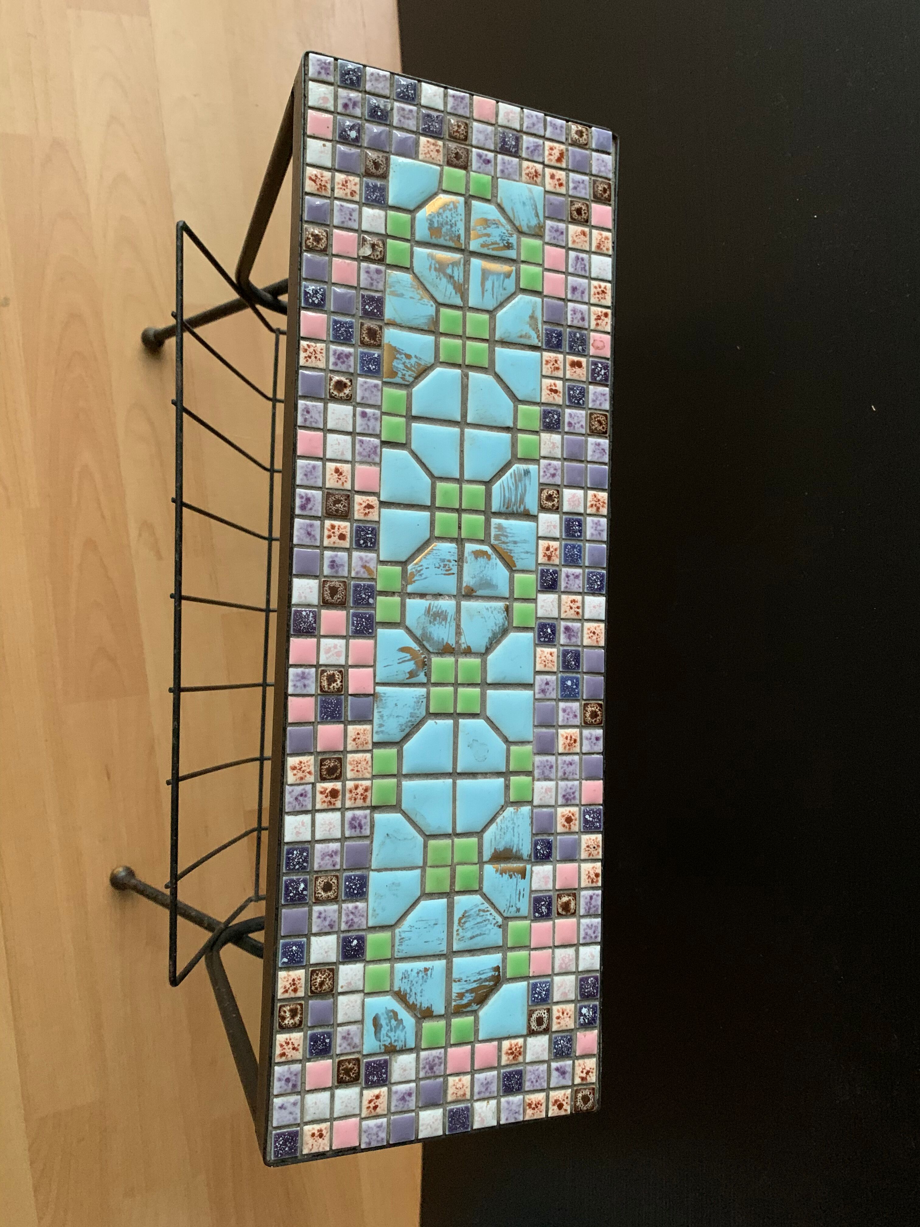 Wrought iron and ceramics side table