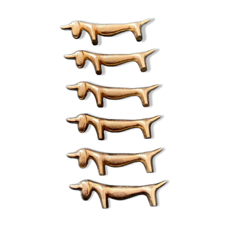 6 dog-shaped knife holders in fine gold-plated metal
