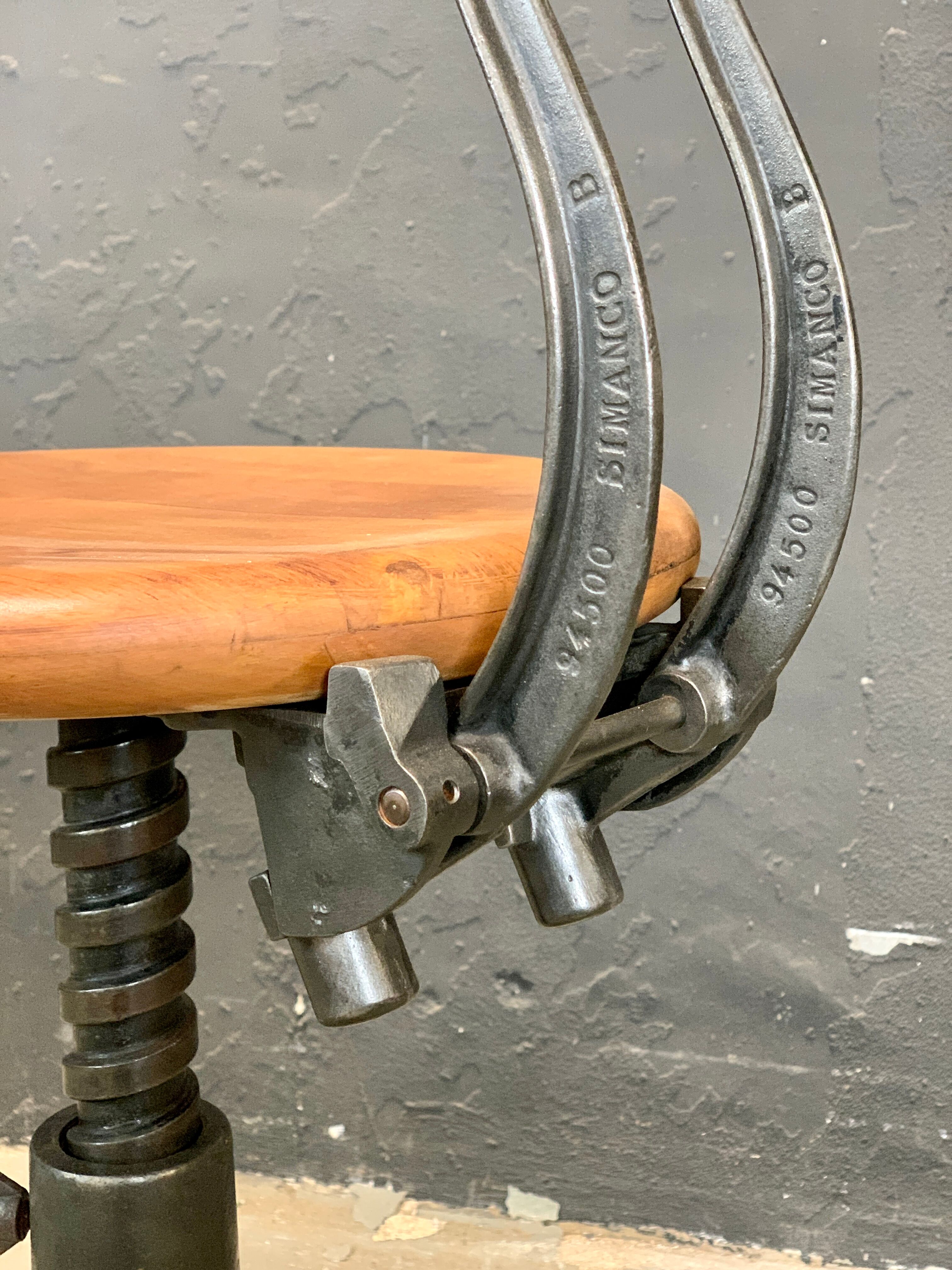 Singer industrial stool with back 1920