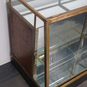 Counter or shop window in oak glass and brass France around 1920