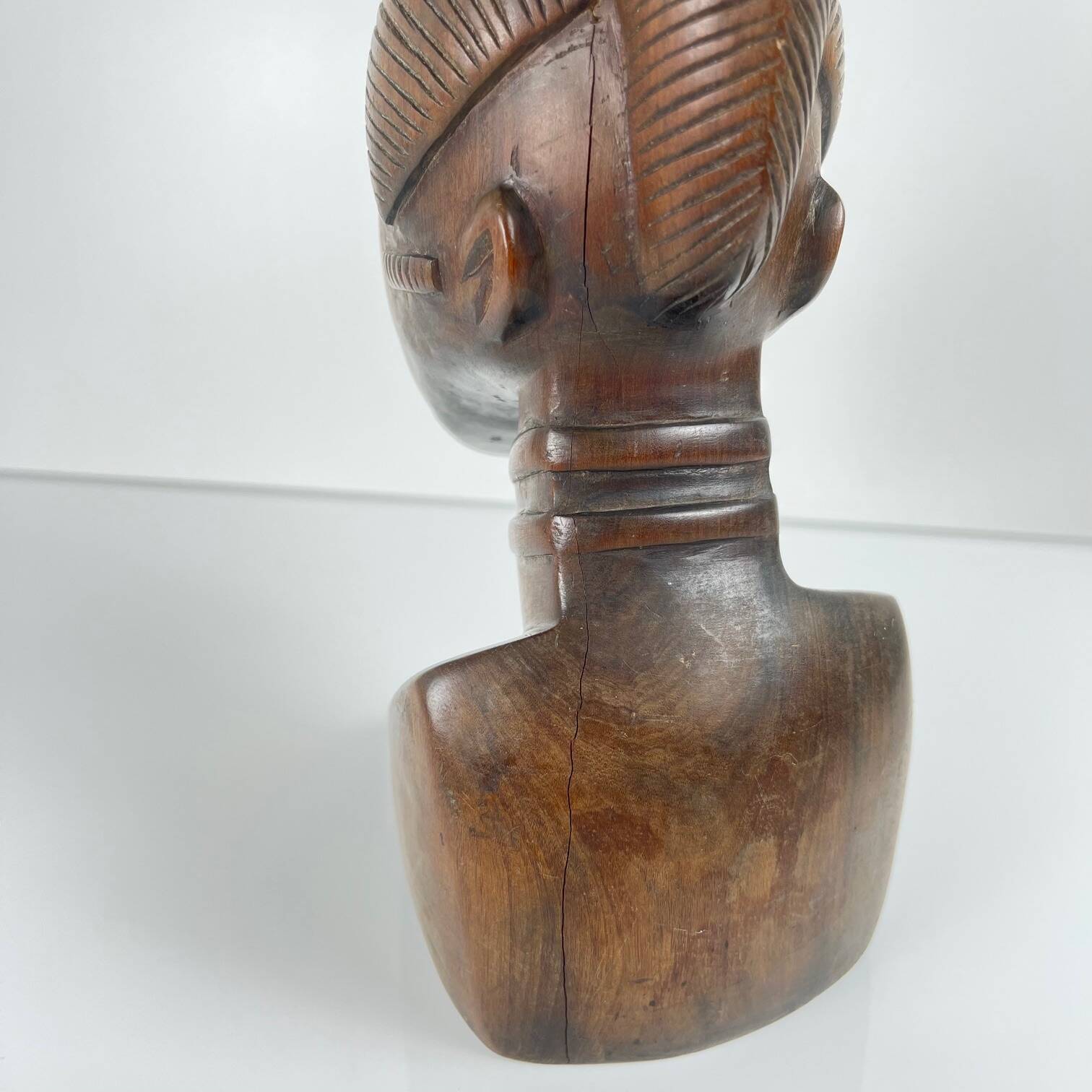 Hand-carved female bust in black wood, Baoulé style, 1960/90