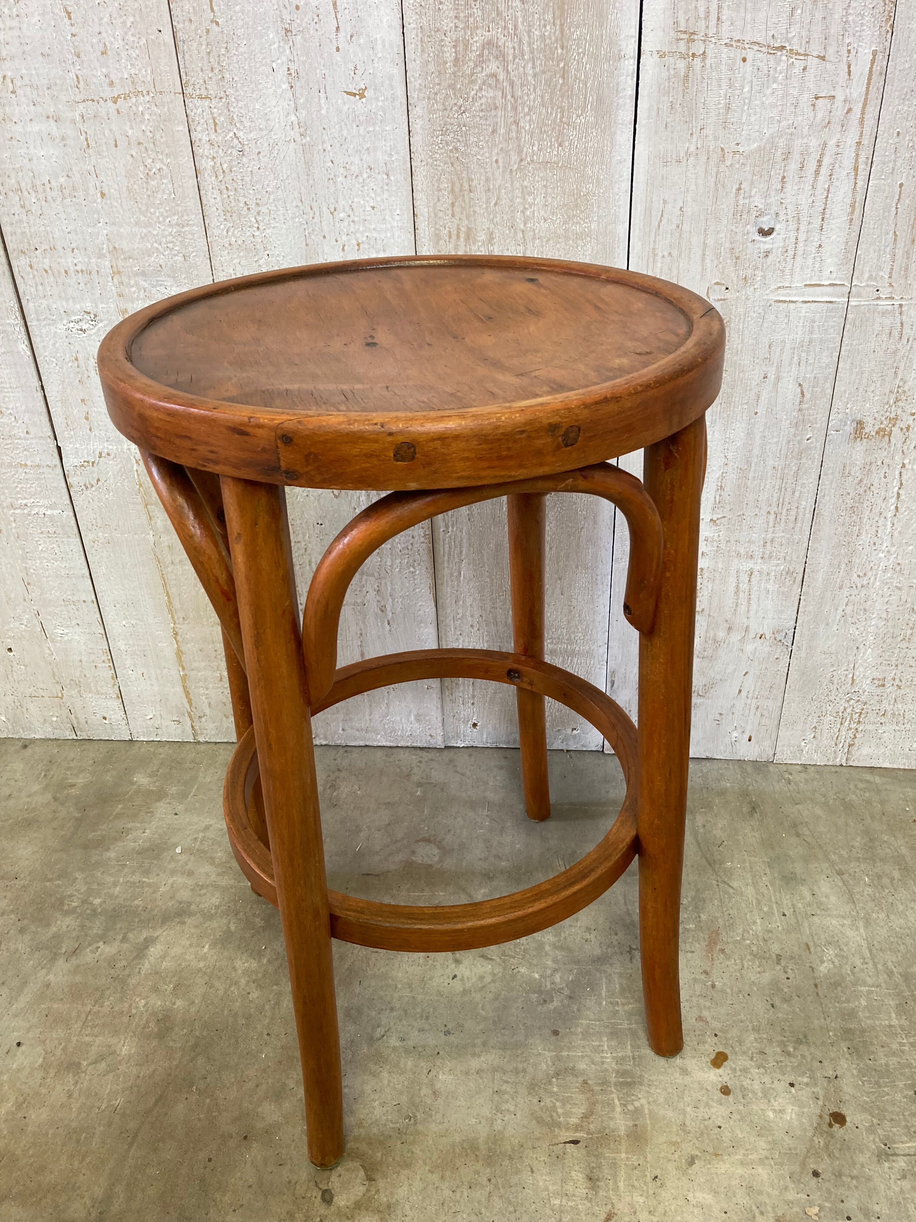 Curved wooden stool