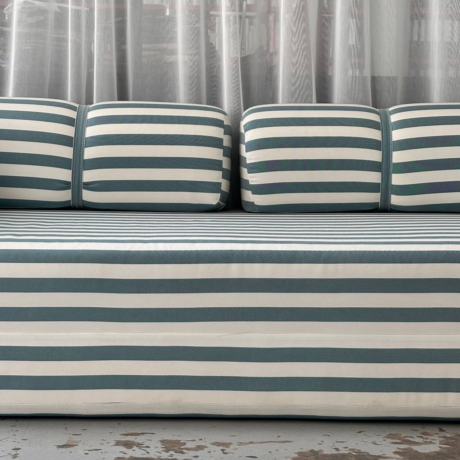 Vintage green and white striped sofa bed