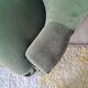 Green velvet armchair
