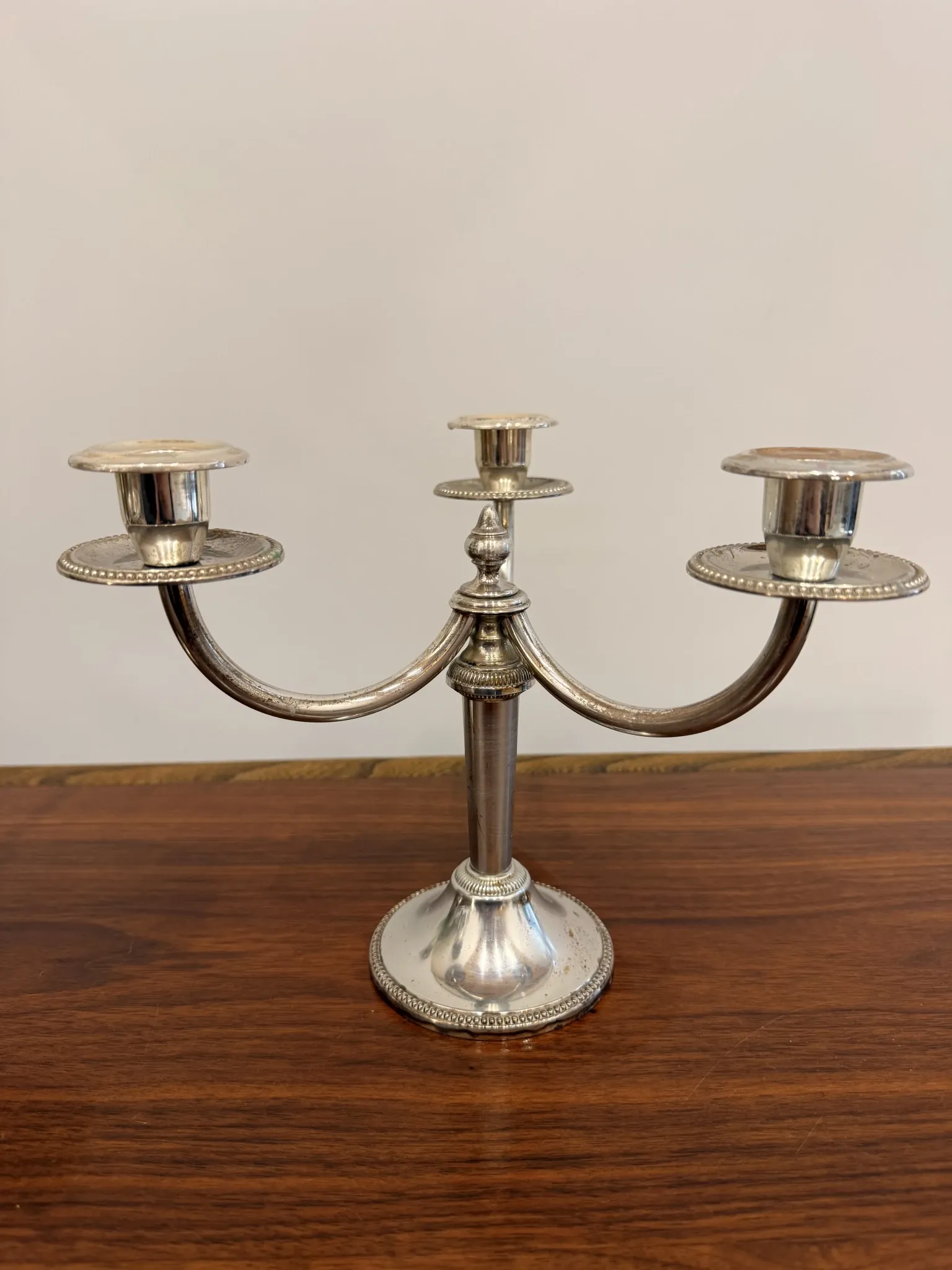 Pair of vintage three-branch silver-plated candlesticks