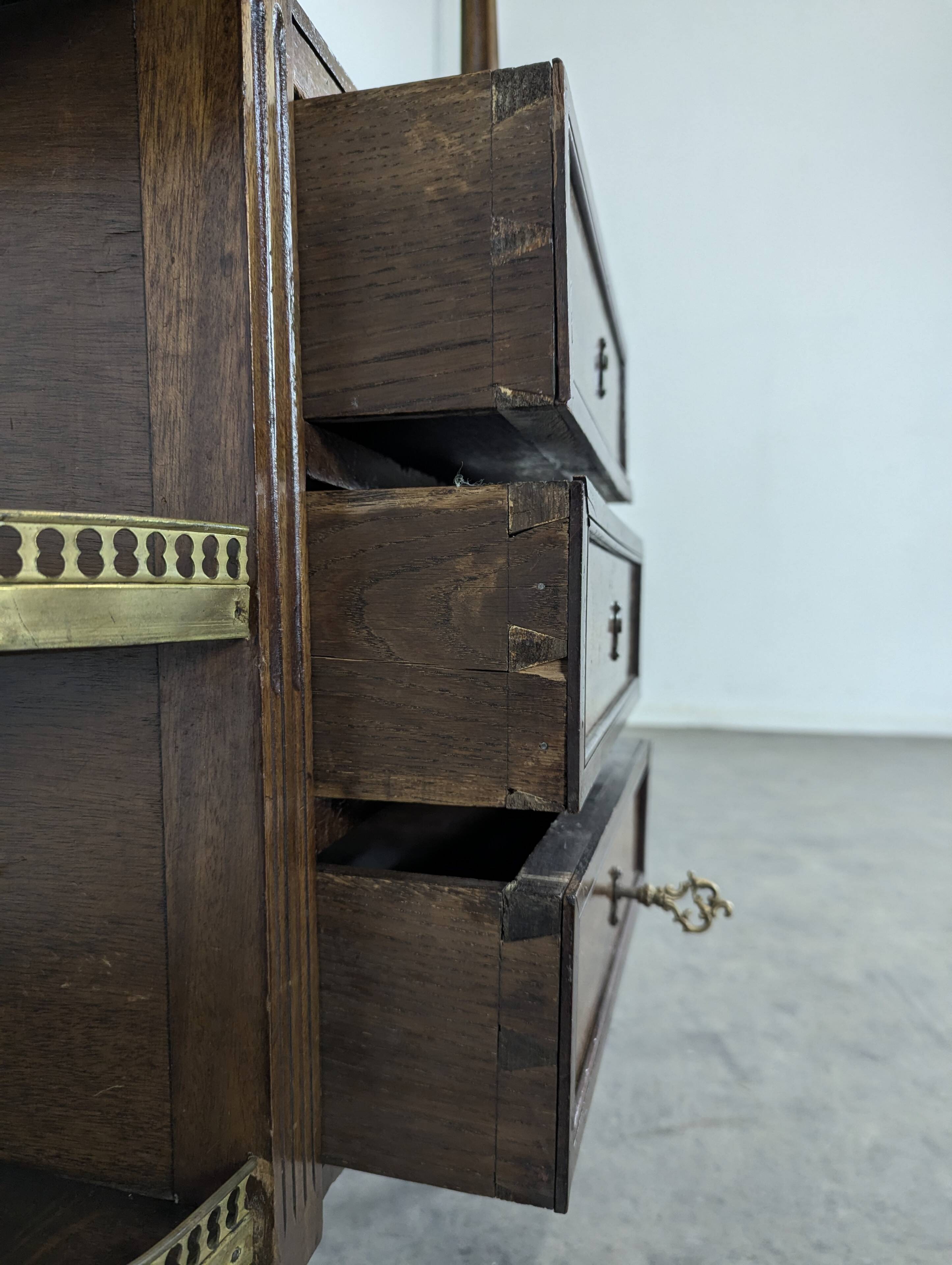 19th-century bar in Louis XVI style made of mahogany.