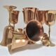 Set of eight vintage solid brass walking glasses