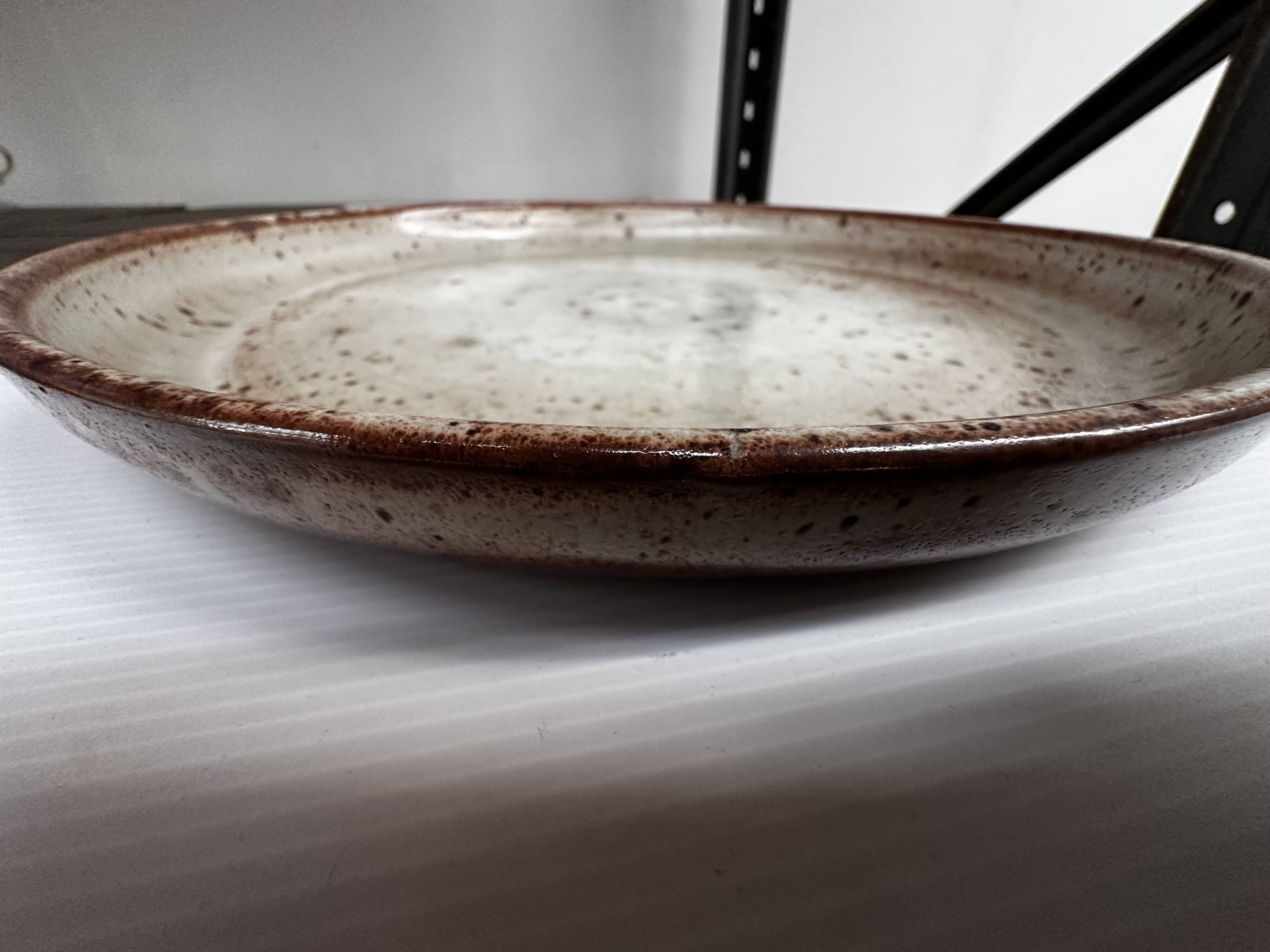 Large round stoneware dish signed Vallauris origin Diameter 30 cm