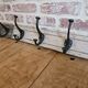 Solid teak coat hook with 4 double cast iron hooks