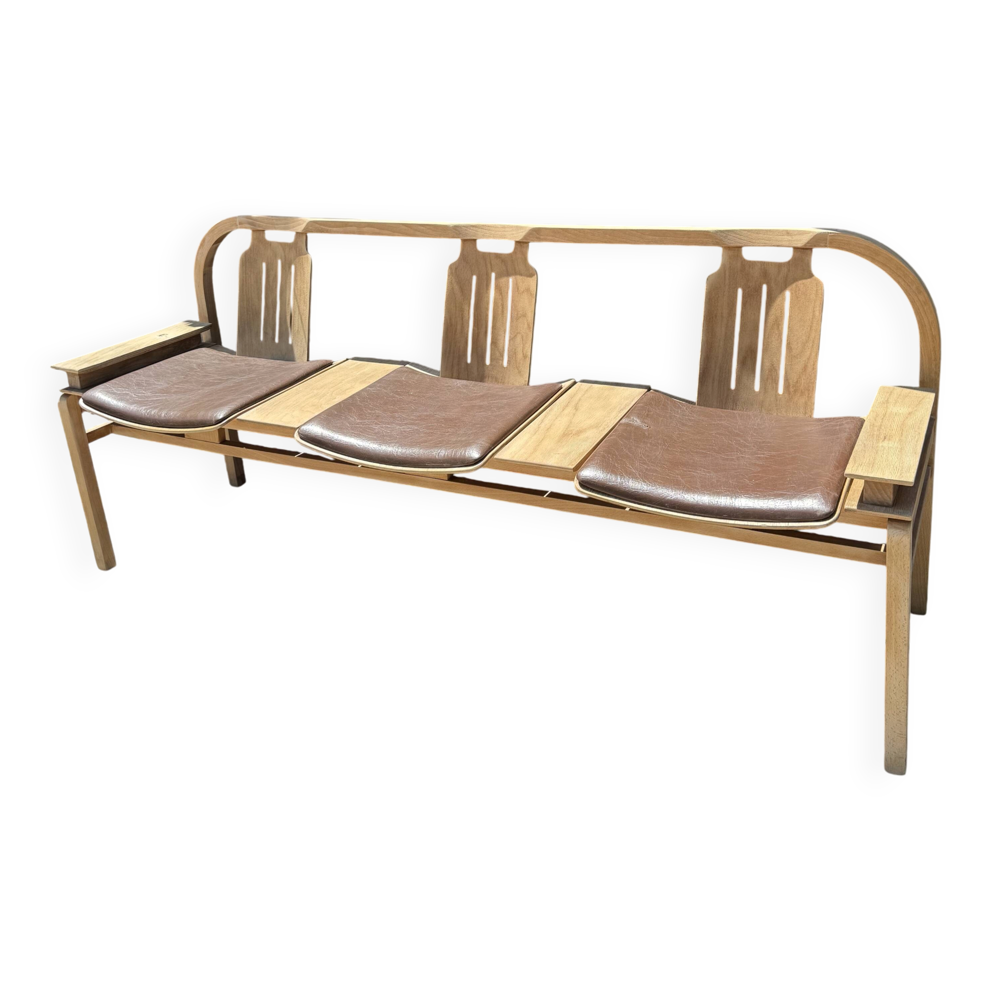 Baumann bench with wooden frame and faux leather seat.