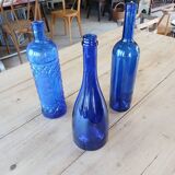 3 blue bottles