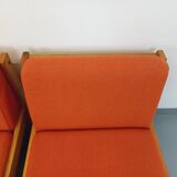 Set of 2 vintage Baumann armchairs in orange fabric and wood from the 80s