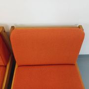 Set of 2 vintage Baumann armchairs in orange fabric and wood from the 80s