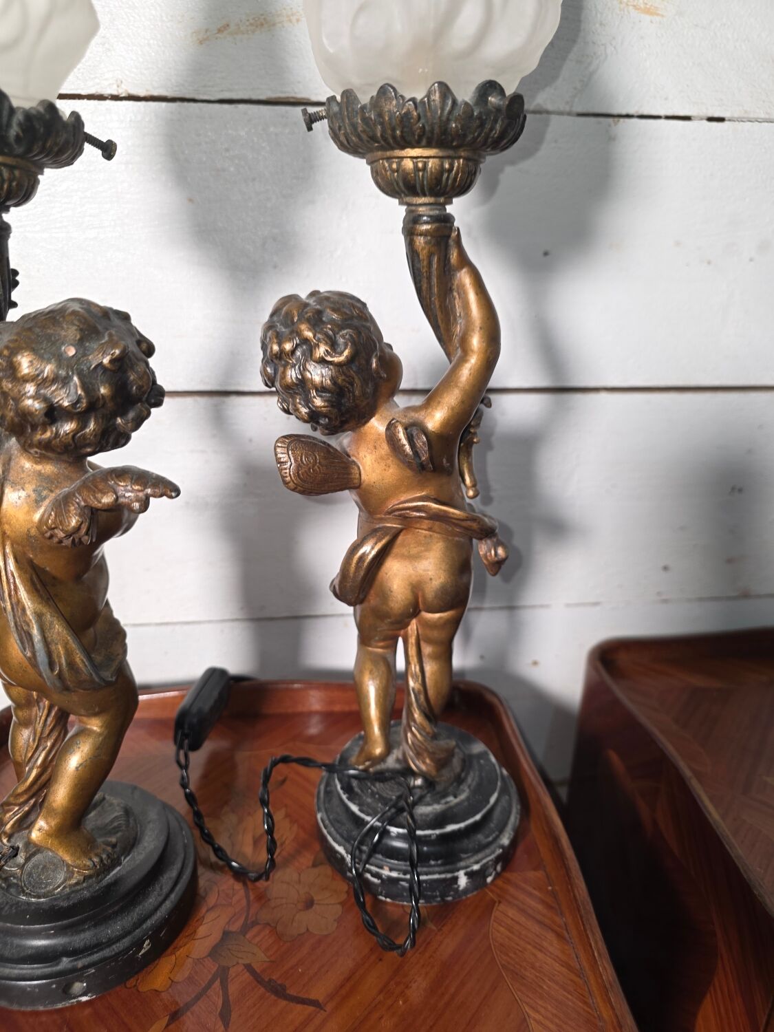 Pair of putti angel lamps from the 19th century.