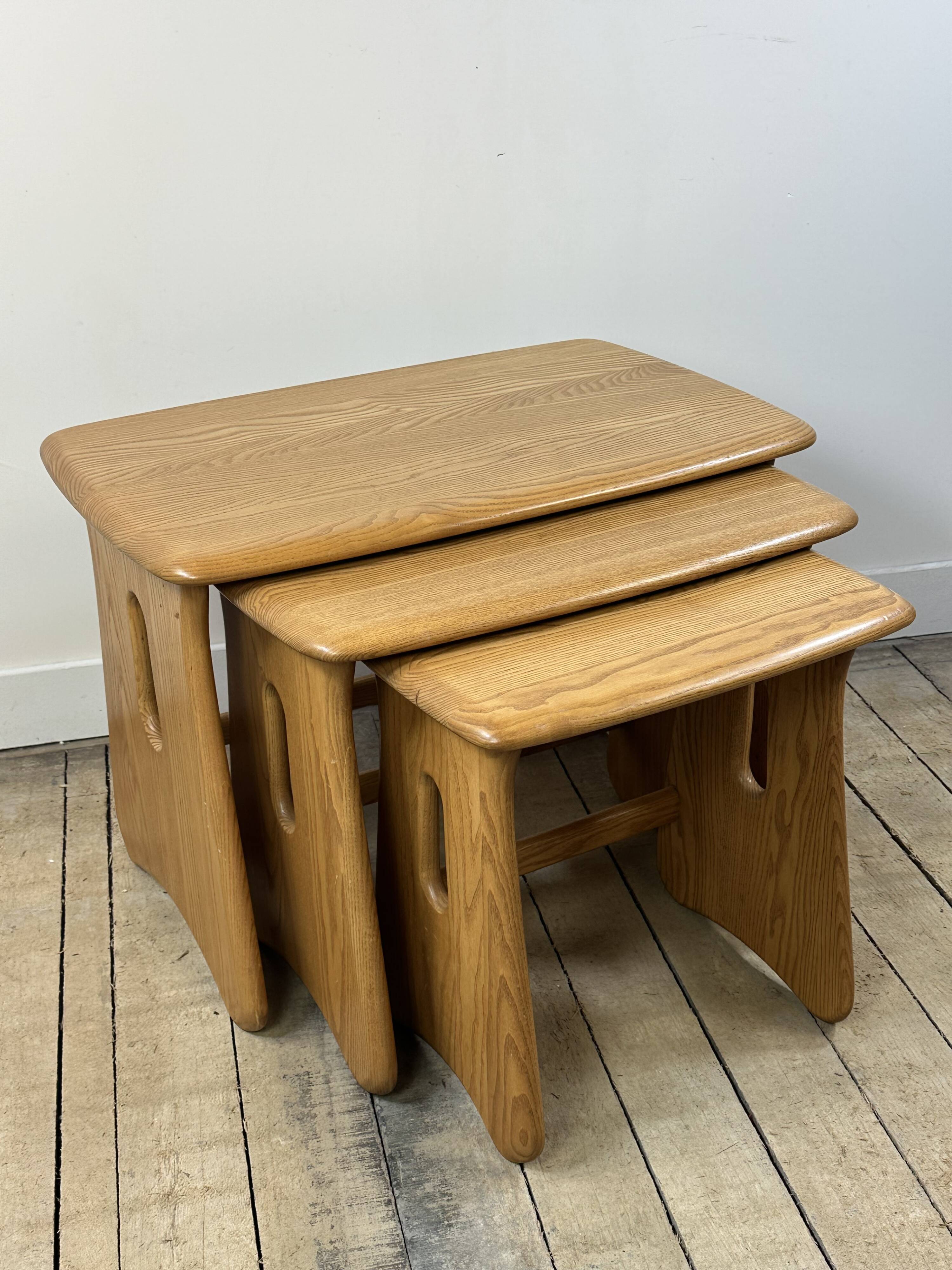 Vintage Ercol nesting tables in solid elm from the 1980s.